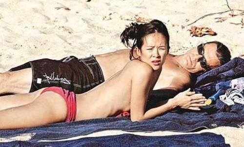 章子怡沙滩门的照片其实当时她和外籍男友之所以敢这么明目张胆
